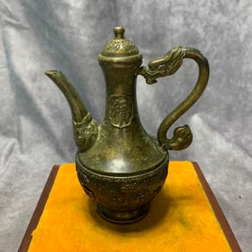 BRONZE TEAPOT WITH "YA" MARK AND AUSPICIOUS PATTERN