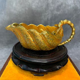 A FINE GOLD PLATED BRONZE SAUCE BOWL