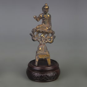 A SMALL TIBETAN BUDDHIST STATUE