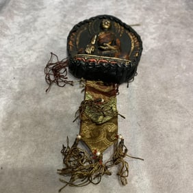 A FINE WOOD CARVING TIBETAN PENDANT