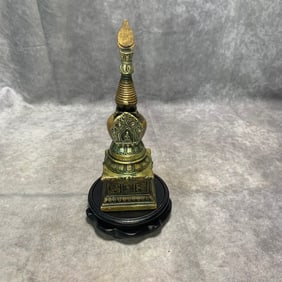 A FINE TIBETAN BRONZE RELIQUARY STUPA INLAID WITH SILVER