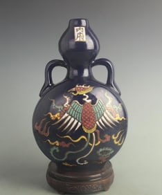 MUSTARD-GLAZED MOONFLASK WITH PHOENIX PATTERNS (DOUBLE BELLY)