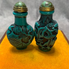TWO CELLULOID MADE SNUFF BOTTLES