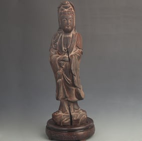 A WOODEN LACQUERED STATUE OF GUANYIN