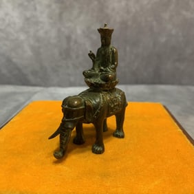 A FINE BUDDHA ON ELEPHANT BRONZE STATUE