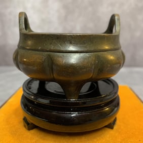 A FINE THREE FOOT HIGH EAR ROUND BRONZE CENSER