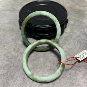 PAIR OF JADEITE BRACELETS