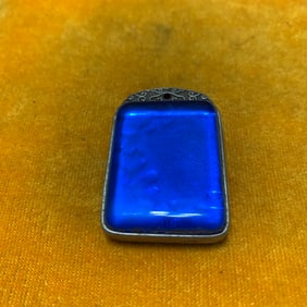 SILVER-INLAID GLASS PENDANT