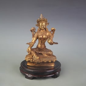 A FINE BRONZE GREEN TARA STATUE