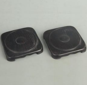 PAIR OF EBONY WOOD CARVED ROUND BASES