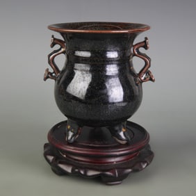 A FINE BLACK GLAZED RUYI EAR TRIPOD PORCELAIN CENSER