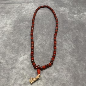 A FINE PUTI SEED NECKLACE