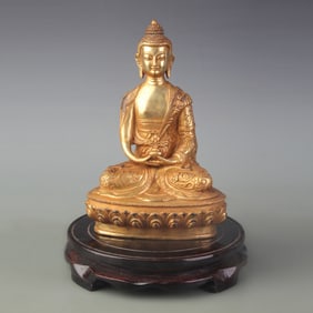 A FINE BRONZE MEDICINE BUDDHA