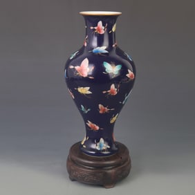 FAMILLE-ROSE HUNDRED BUTTERFLIES GUANYIN PORCELAIN VASE