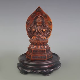 A FINE SMALL BOXWOOD MADE THOUSAND HAND GUAN YIN STATUE