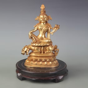 A FINE BRONZE GUANYIN STATUE