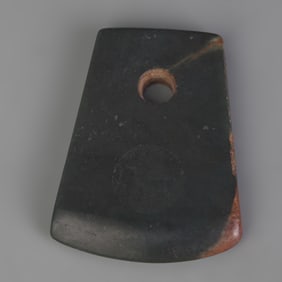 A FINE JADE MADE AXE