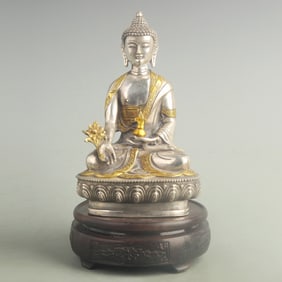 BRONZE THREE-TREASURE BUDDHA WITH GILT AND SILVER INLAY