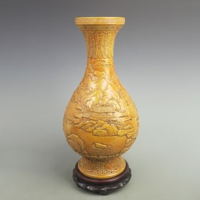 YELLOW GROUND CARVED LANDSCAPE PATTERN VASE