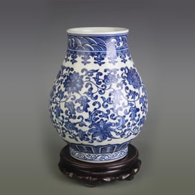 BLUE-AND-WHITE LOTUS SCROLL ZUN VESSEL