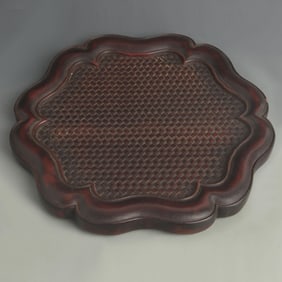 A FINE EBONYWOOD AND CARVED TEA TRAY