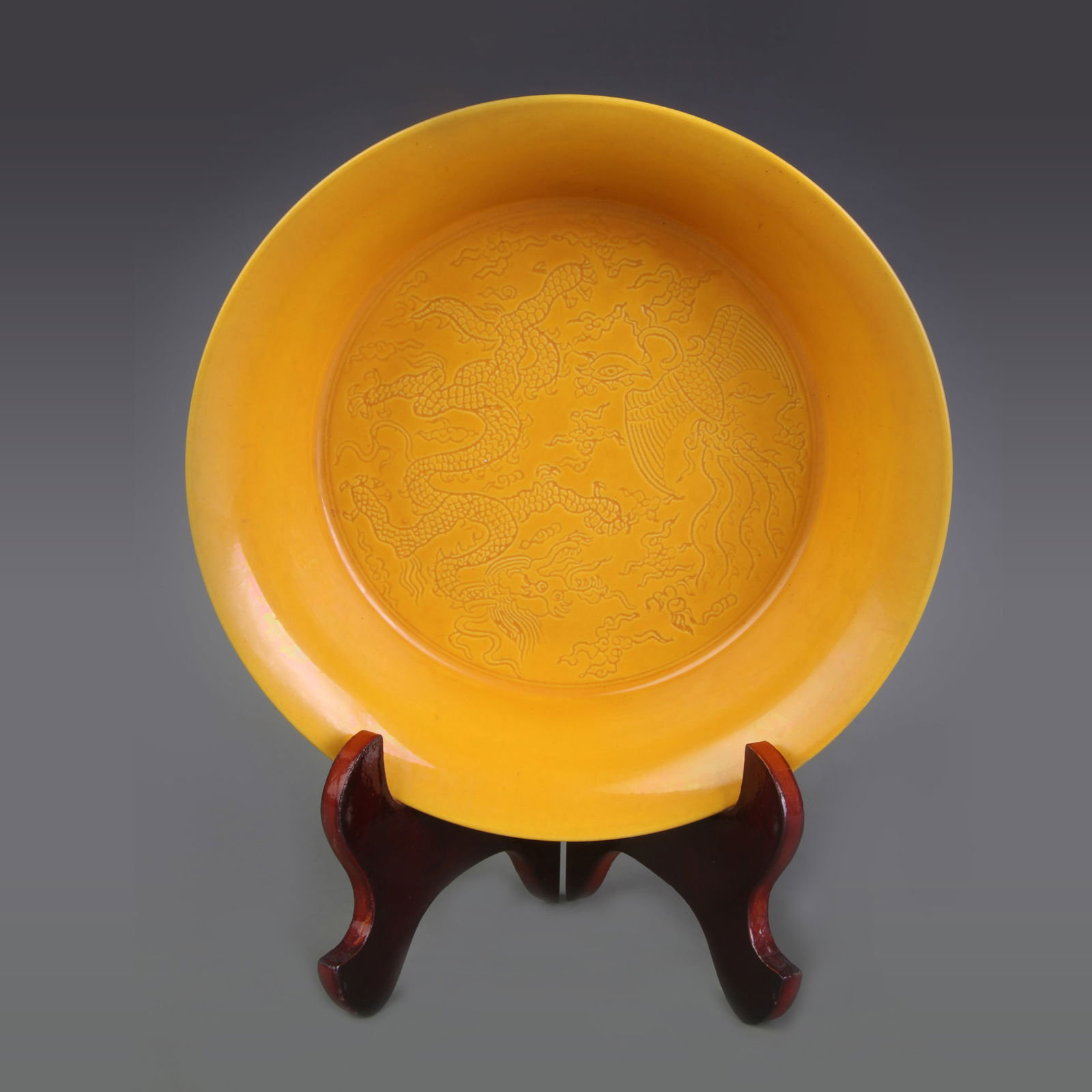YELLOW GLAZED INCISED DRAGON AND PHOENIX PLATE: Ming Dynasty Hong Zhi Period; Diameter: 8.7 inch; High: 2.5 inch