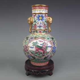 FAMILLE ROSE VASE WITH OPENWORK PANEL AND ELEPHANT HANDLES