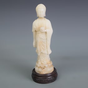A FINE WHITE JADE MADE BUDDHA STATUE