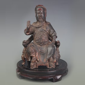 A FINE BRONZE STATUE OF GUAN YU ON THRONE