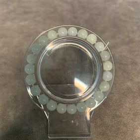 A FINE JADE MADE BRACELET