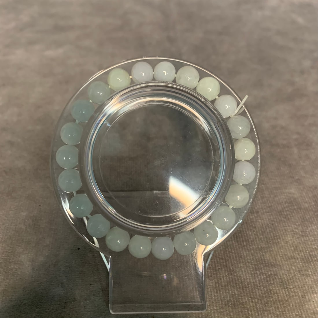 A FINE JADE MADE BRACELET (1 of 3)