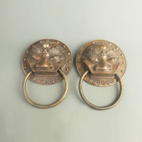 PAIR OF BRONZE DOOR-RING FITTING