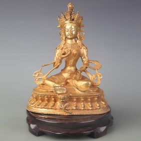 A FINE BRONZE TIBETAN BUDDHIST STATUE