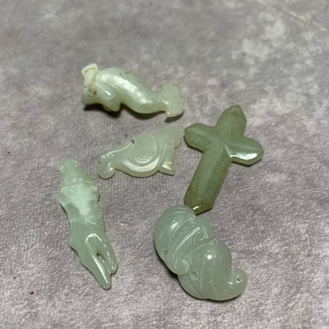 GROUP OF HETIAN PALE CELADON JADE ITEMS: Qing Dynasty; Long: 1.8 inch to 1.3 inch; Width: 1.1 inch to 1.5 inch; High; 0.5 inch to 0.1 inch;
