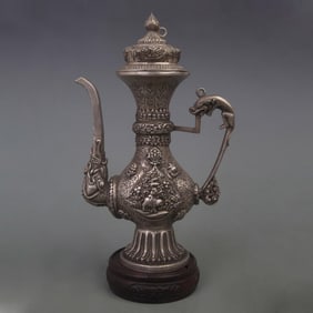 A FINELY CARVED WHITE BRONZE SWER