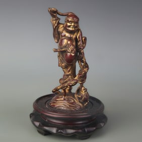 BRONZE AND GOLD-PAINTED OLD MAN FIGURINE