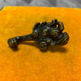 A FINE BRONZE BELT HOOK WITH SEAL