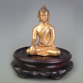 A SMALL BRONZE SHAKYAMUNI BUDDHA STATUE