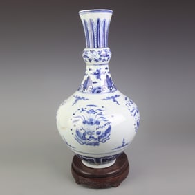 BLUE AND WHITE PORCELAIN VASE WITH FLOWER AND BIRD PATTERN
