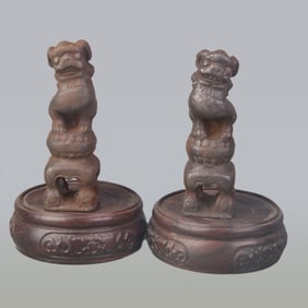 PAIR OF SMALL CAST IRON LION FIGURINES