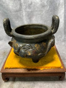 BRONZE INCENSE BURNER WITH ELEPHANT PATTERN AND THREE LEGS