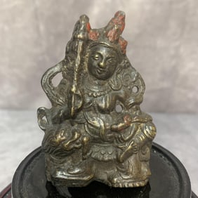 A FINE SMALL BRONZE TIBETAN PENDANT