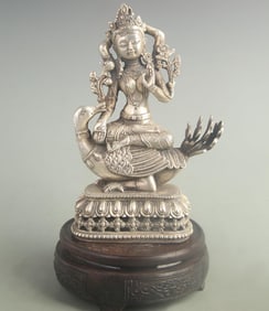 A FINE WHITE BRONZETIBETAN MANTRA-PROTECTOR STATUE