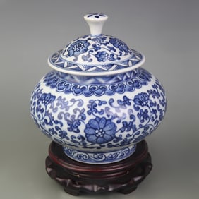 BLUE AND WHITE PORCELAIN JAR WITH FLORAL DECORATION