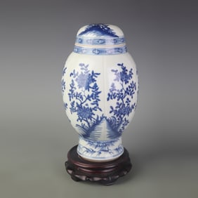 BLUE AND WHITE JAR WITH FLORAL DECORATION