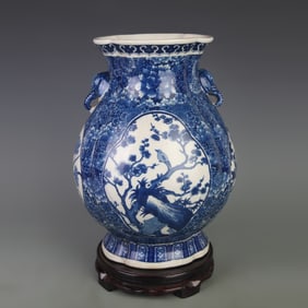 BLUE AND WHITE “OPENWORK?? FLORAL ELEPHANT-HANDLED VASE