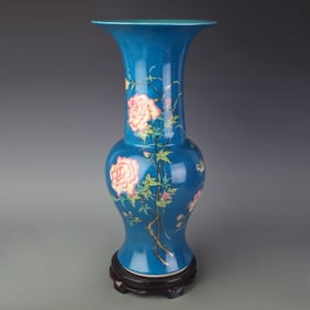 FAMILLE ROSE PEACOCK ON BLUE-GLAZED VASE WITH FLORAL AND BIRD DECORATION