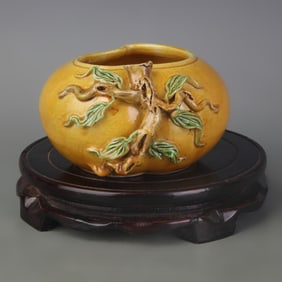 YELLOW-GLAZED CARVED PEACH-SHAPED PORCELAIN WATER POT