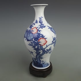 BLUE AND WHITE YOU LI HONG GLAZED OLIVE SHAPED PORCELAIN VASE