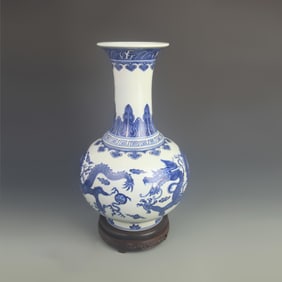 BLUE AND WHITE OPEN-MOUTH VASE WITH DRAGON DECORATION